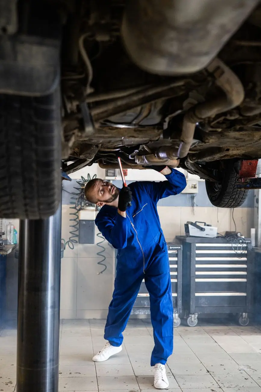 Technician servicing equipment